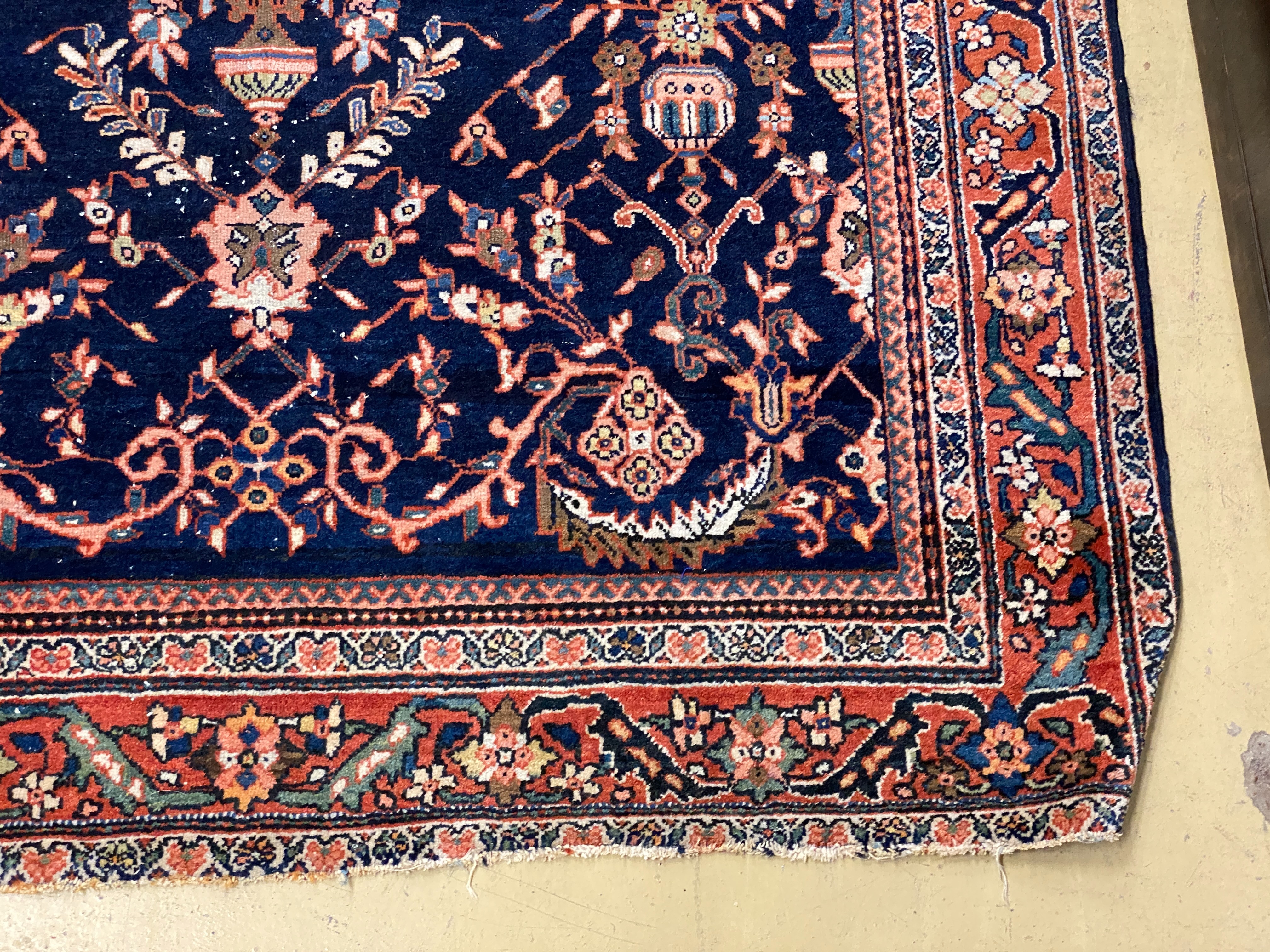 A North West Persian blue ground rug, 200 x 130cm